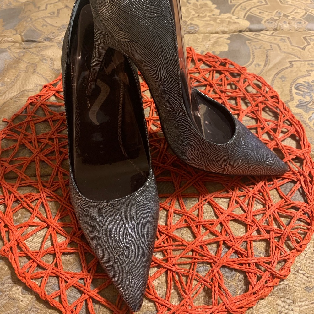 Silver and black heels